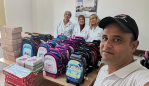 Purchase of school materials and rehabilitation of a school 